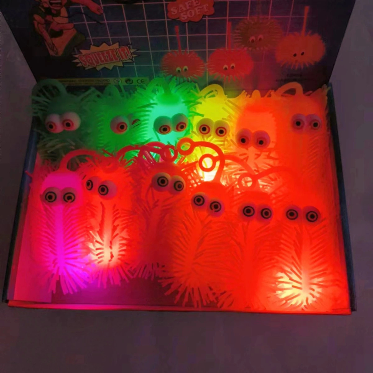 ZABAWKA ANTYSTRESOWA SILIKONOWY GNIOTEK GĄSIENICA ŚWIECĄCY LED SENSORYCZNY