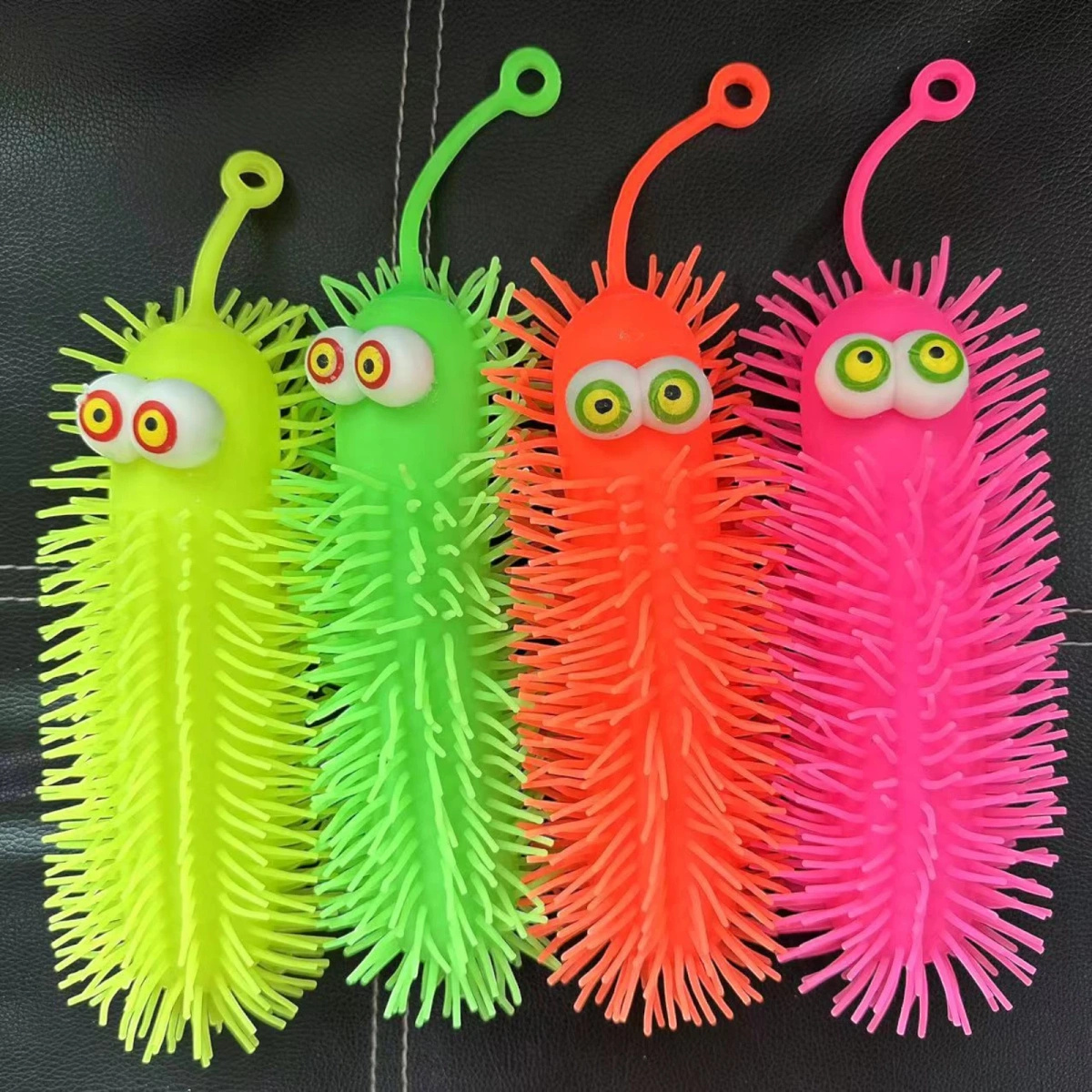 ZABAWKA ANTYSTRESOWA SILIKONOWY GNIOTEK GĄSIENICA ŚWIECĄCY LED SENSORYCZNY