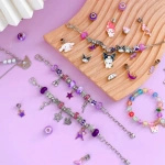 ZESTAW DO ROBIENIA BRANSOLETEK BIŻUTERII DLA DZIECI KUROMI FIOLET KUFEREK